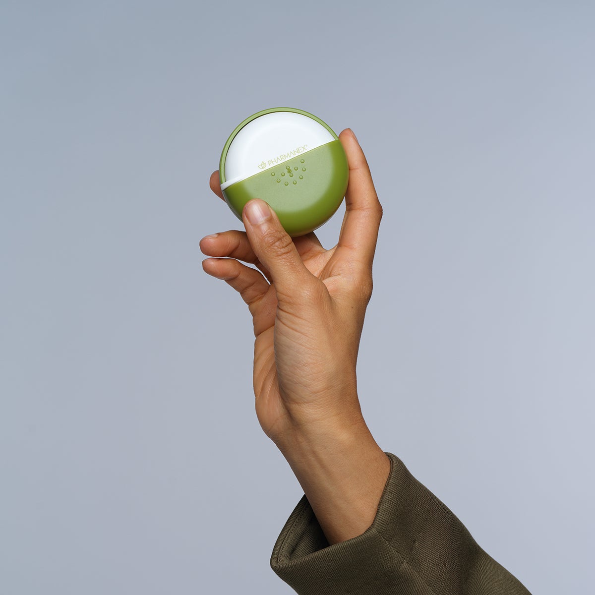 Pharmanex Pillbox In Hand Lifestyle Image